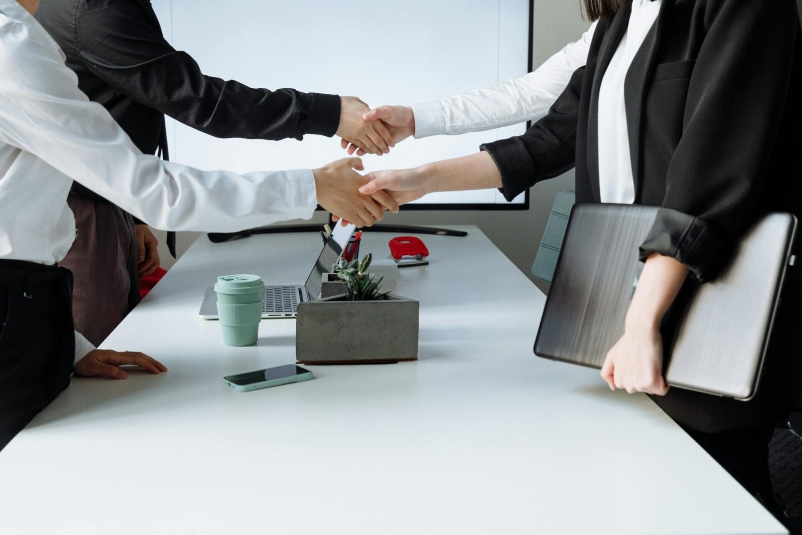 A team of professionals collaborating in an office setting.